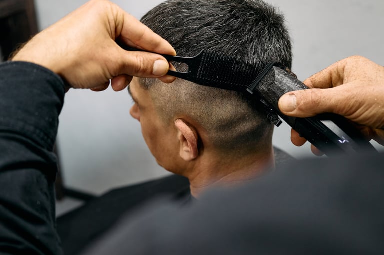 Barber creating a smooth fade haircut